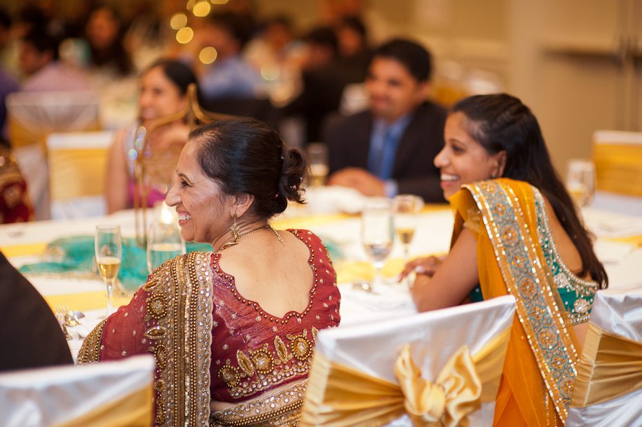 listening to speech at wedding Indian Wedding Guests
