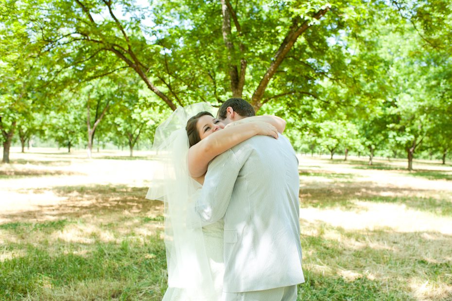 bride and groom seeing each other before wedding