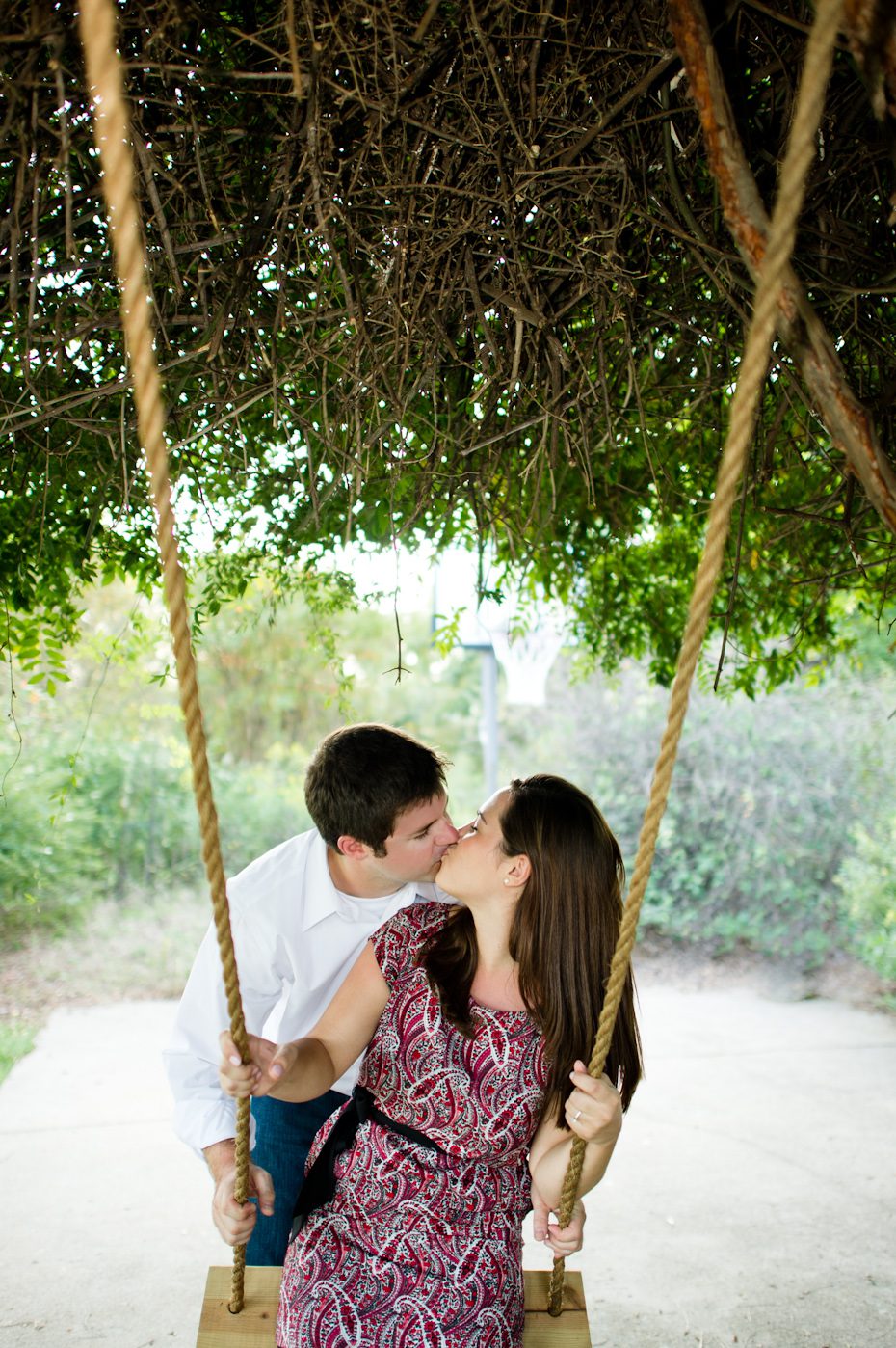 Engagement pictures on a swing