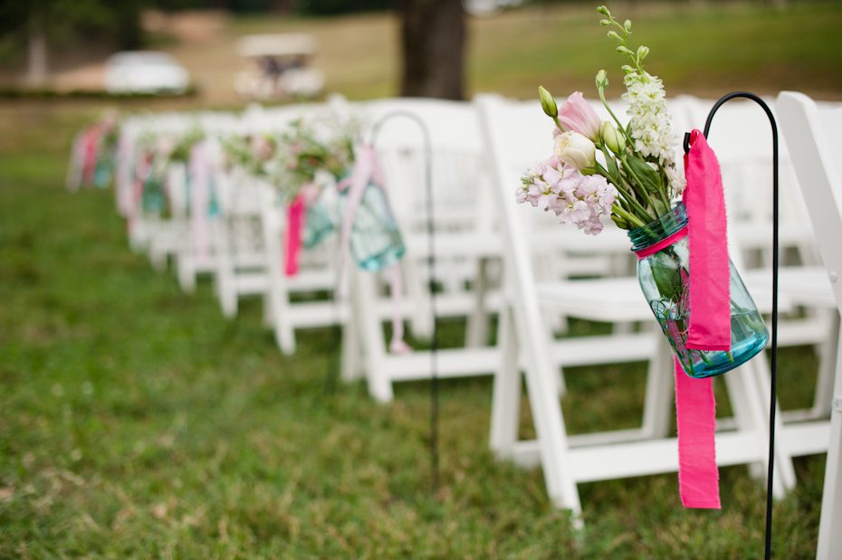 flowers on shepard's hooks at wedding