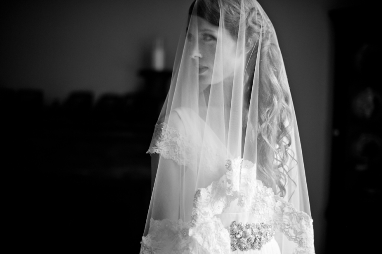 Bride with veil over her face