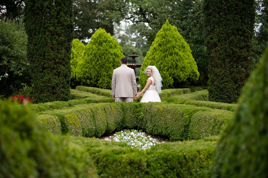 Bride and Groom in Boxwood Garden at Barnsley