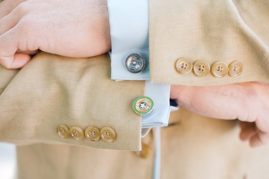 Superhero cufflinks at wedding