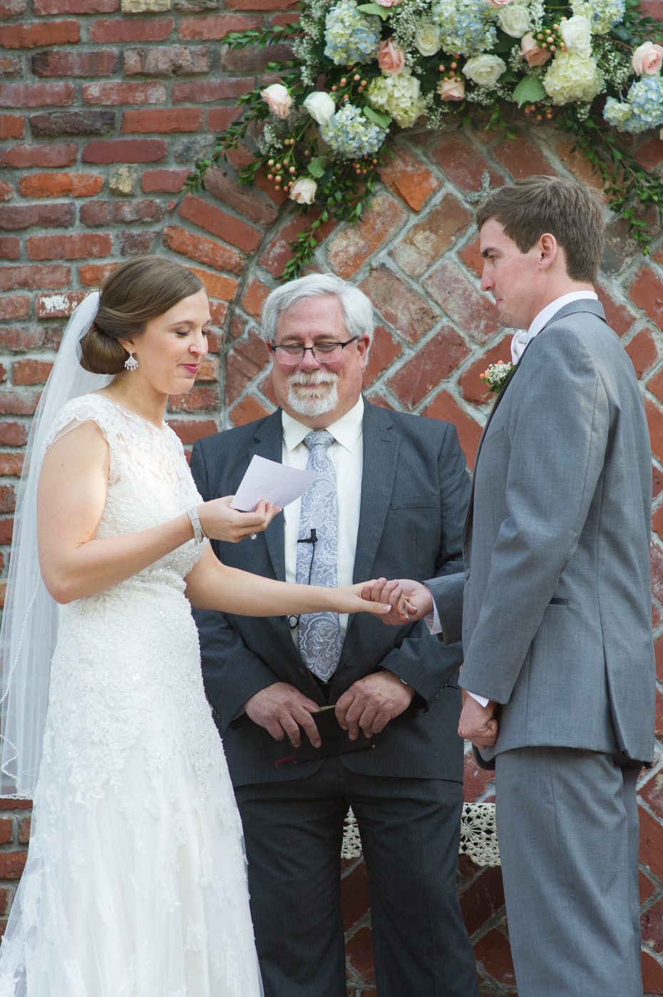 bride reading vows to groom
