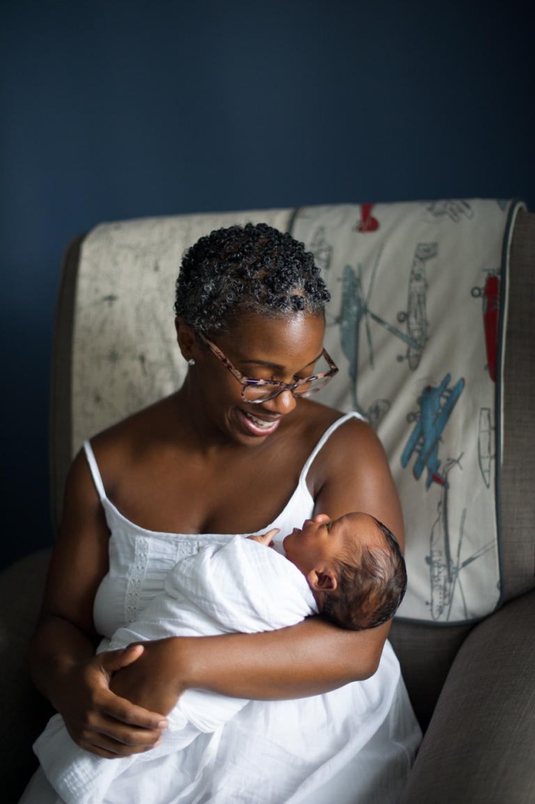 Portraits of mom with newborn