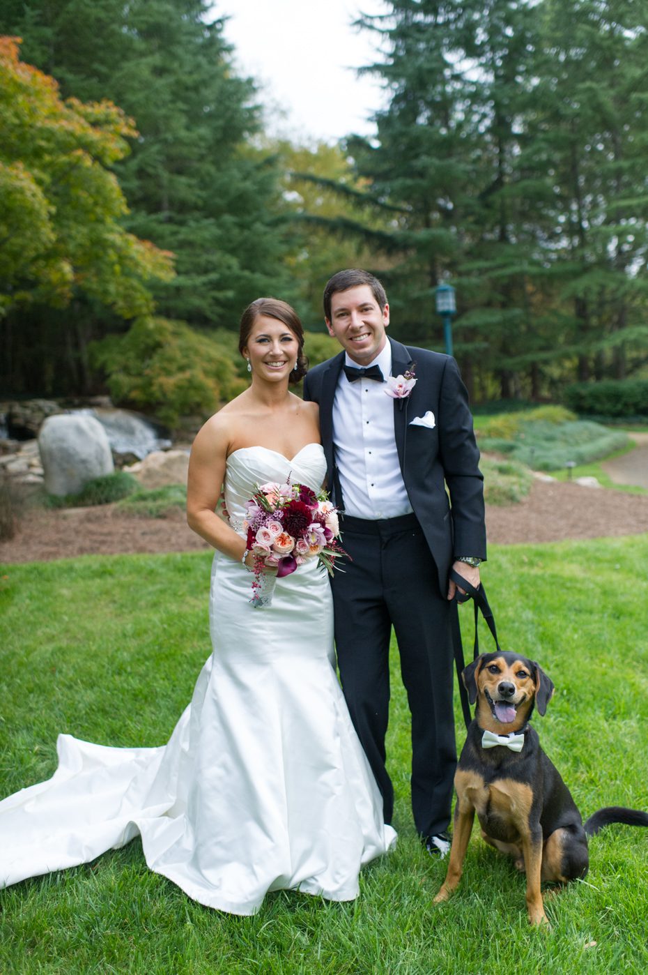 Bride and Groom with Dog at Wedding