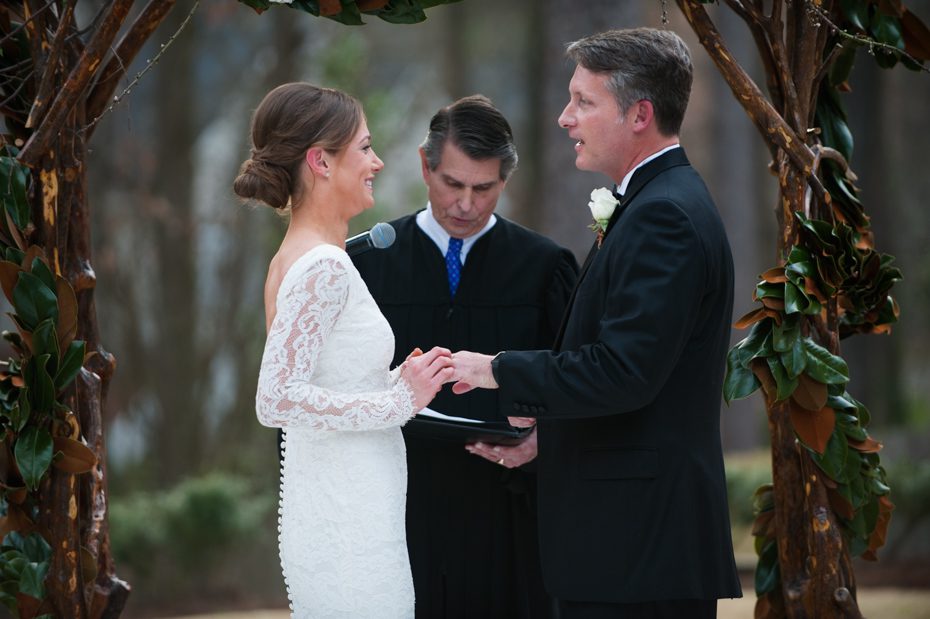 Exchanging rings at home wedding