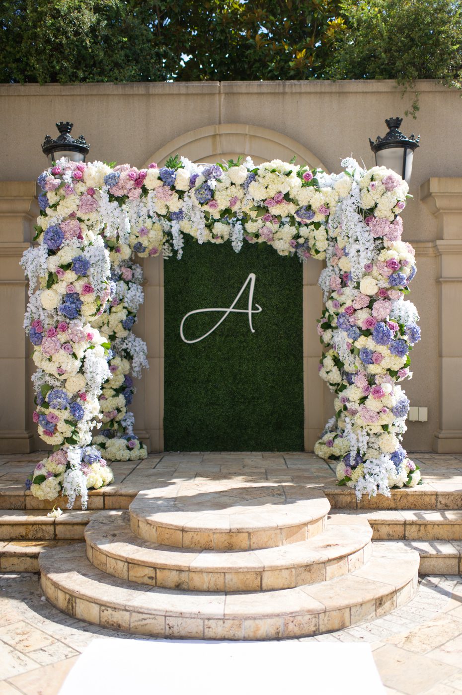 Flower covered arbor at St. Regis Atlanta by Legendary Events
