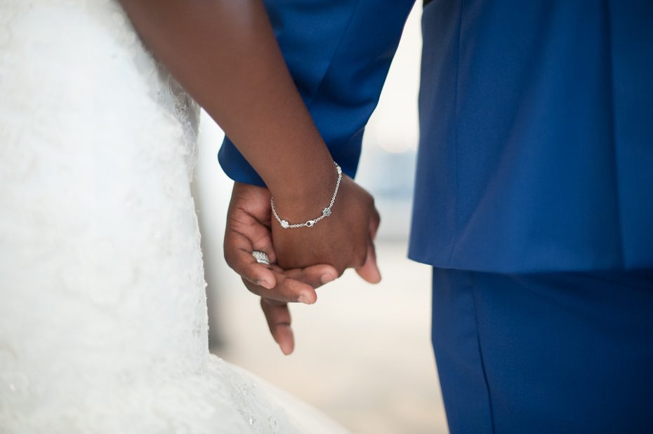 Bride and Groom Holding Hands