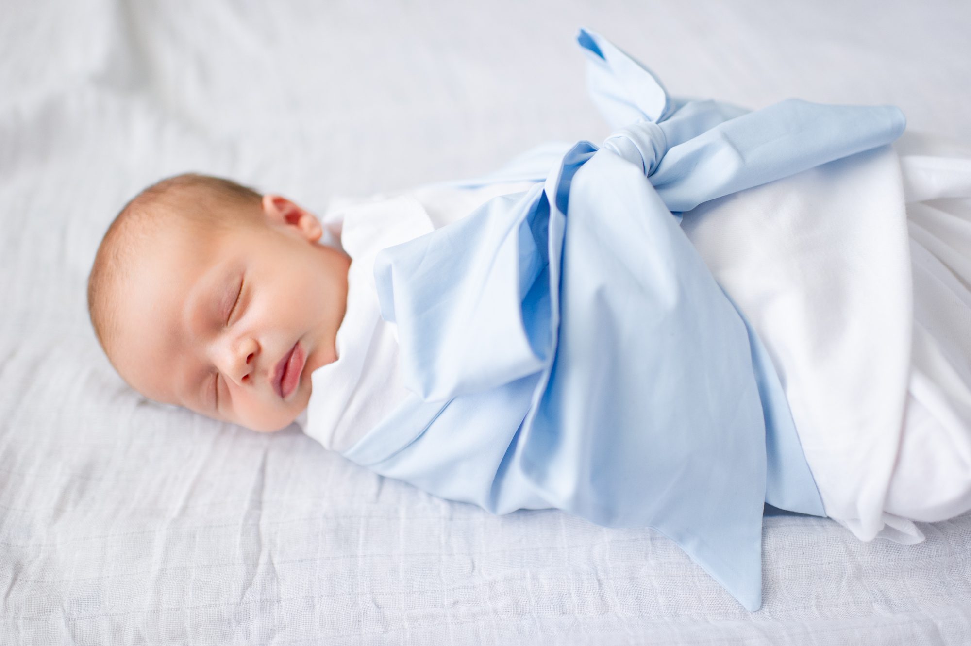 Baby in Beaufort Bonnet Swaddle